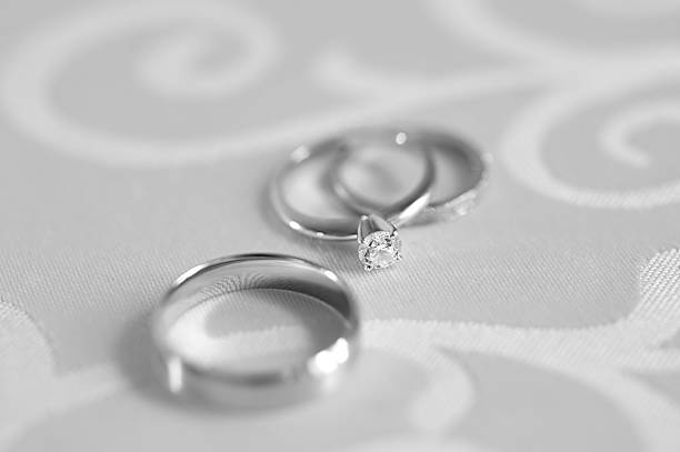 Engagement and wedding rings stock photo