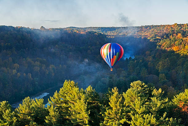 Launching At Sunrise Hot Air Balloon Launching At Sunrise At Letchworth State Park In New York. letchworth state park stock pictures, royalty-free photos & images