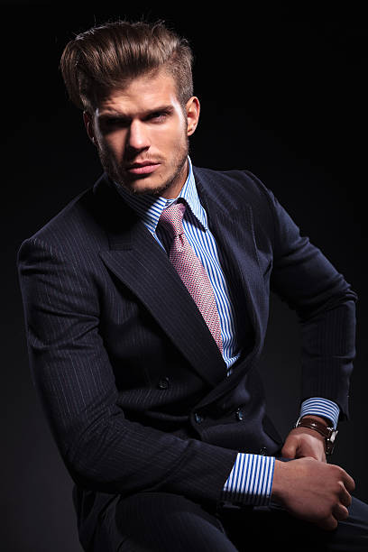istock young business man is seated and looking away 459925427