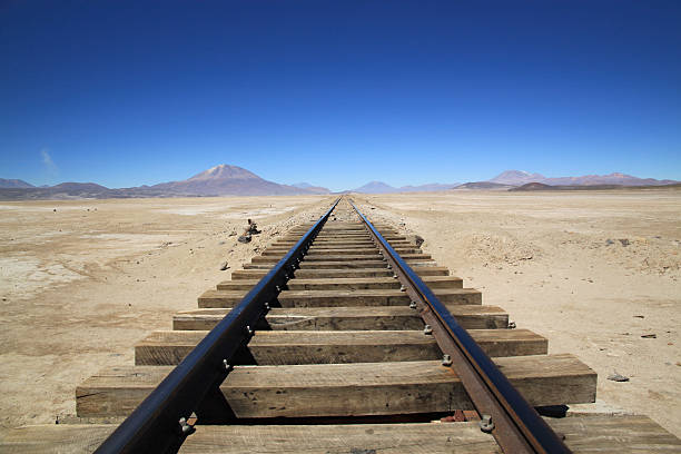 Railway in Uyuni Salt Flats, Bolivia, South America Railway in Uyuni Salt Flats, Bolivia, South America end of the line stock pictures, royalty-free photos & images