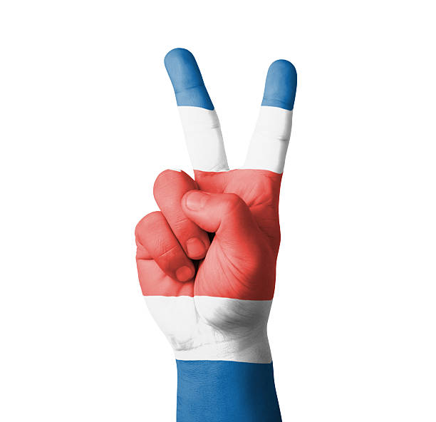 istock Hand making the V sign, Costa Rica flag painted 459928883