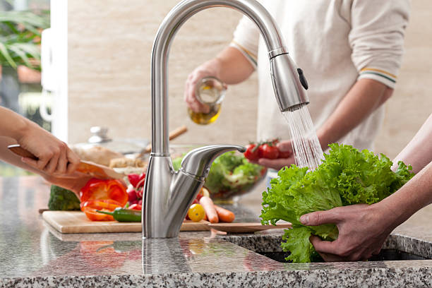 istock Family cooking a dinner together 459929291