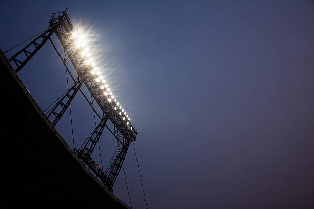 istock Stadium floodlights at night time, Beijing, China 459929321