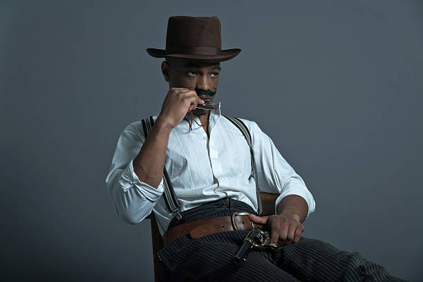 istock Harmonica playing retro afro america western cowboy. 459935231