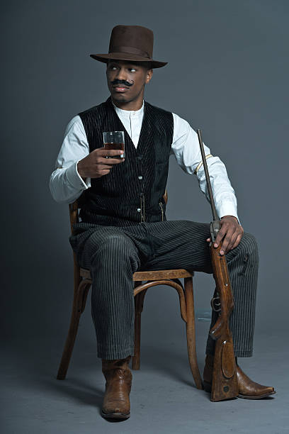 istock Retro afro america western cowboy man with mustache. 459935463