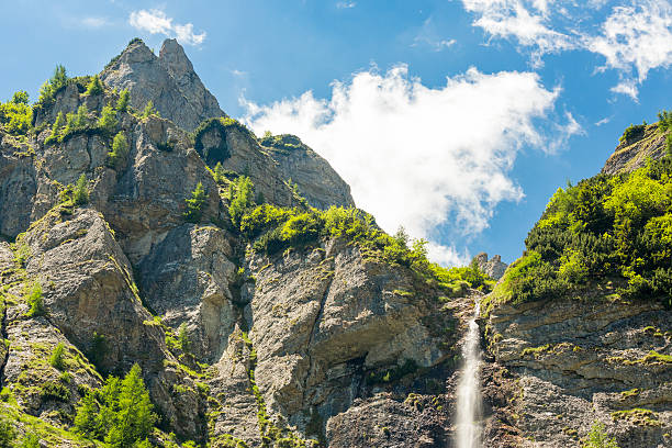 Caraiman waterfall in the Jepi Valley, at an altitude of about 1700 m in Bucegi Mountains, Romania.