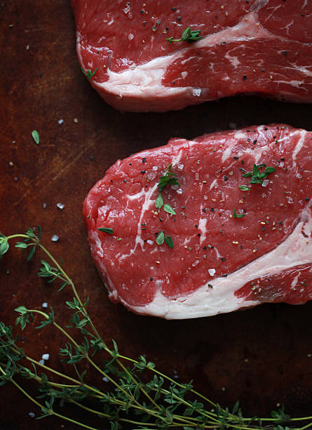 istock Closeup of Ribeye Steaks 459937285