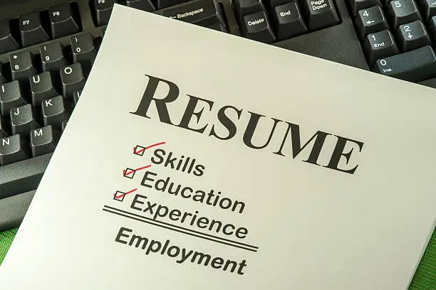 Photo of Successful Employment Concept With Resume Checklist