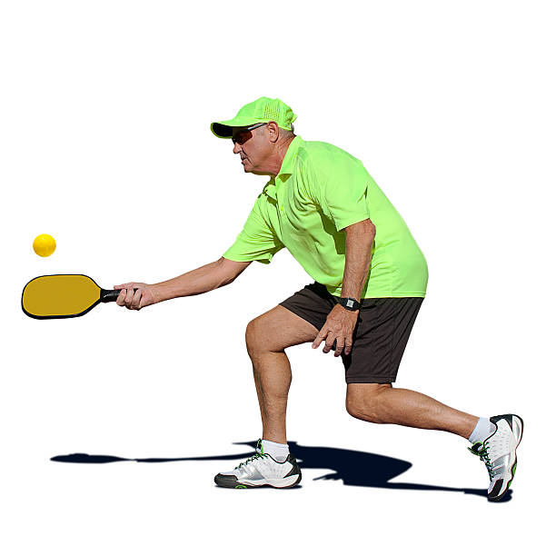 istock Pickleball Action - Senior Male Player Hitting Forehand 459938779