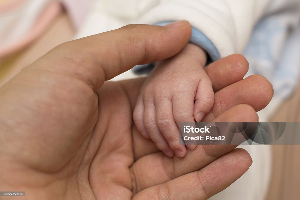 hand of baby Baby - Human Age Stock Photo