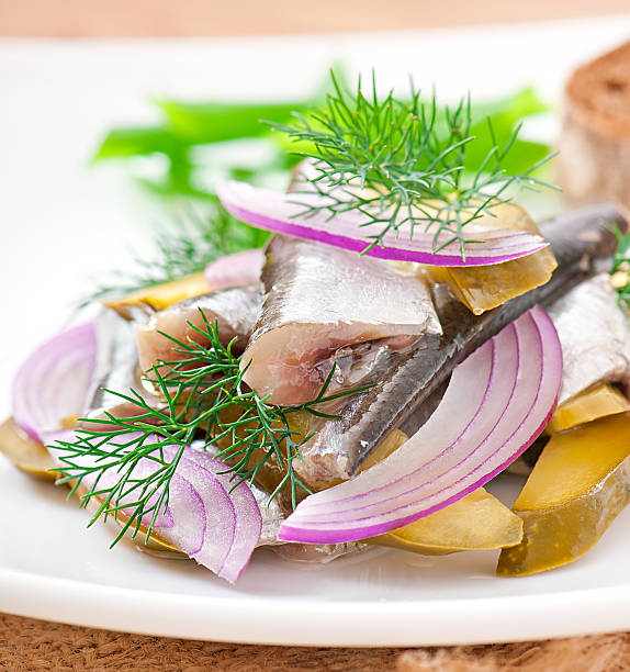istock herring salad with pickled cucumbers and onions 459940671