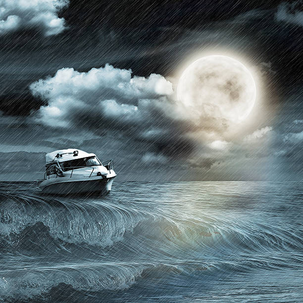 istock Boat in storm  evening on ocean and the moon 459951615