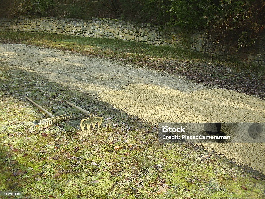 Gravel Path Old drive being covered with new castings (gravel) Driveway Stock Photo