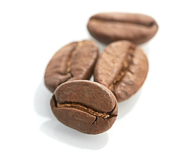 istock Macro of coffee beans isolated on white background 459954911