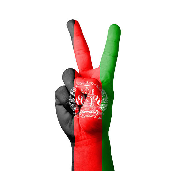 Hand making the V sign, Afghanistan flag painted