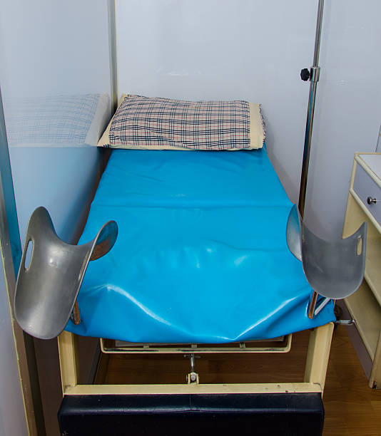 istock bed for gynecologist cabinet 459959793