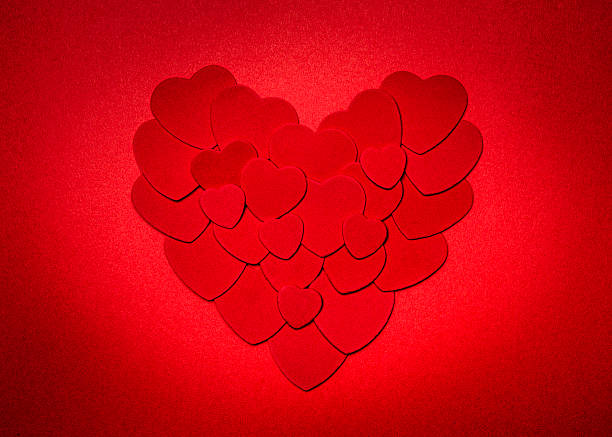 Red Valentines day heart Romantic heart made of many smaller red paper hearts for valentines day felt heart shape small red stock pictures, royalty-free photos & images