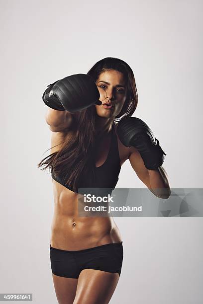 Female Athlete Exercising Boxing Stock Photo - Download Image Now - Boxing - Sport, Fighting, Activity