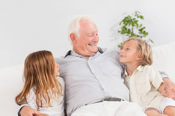 istock Grandfather with his grandchildren 459969657