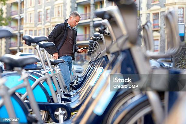 Man Hiring A Bicycle Stock Photo - Download Image Now - Bicycle, Cycling, Recruitment