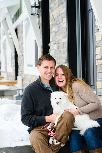 istock Happy Couple with Dog 459970219