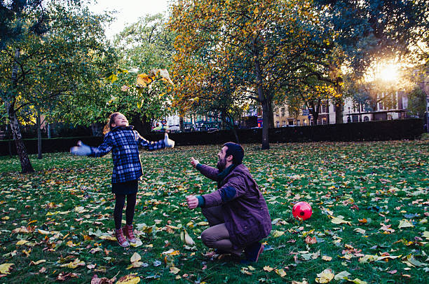 istock Father And Daughter Having Fun In The Park 459970361