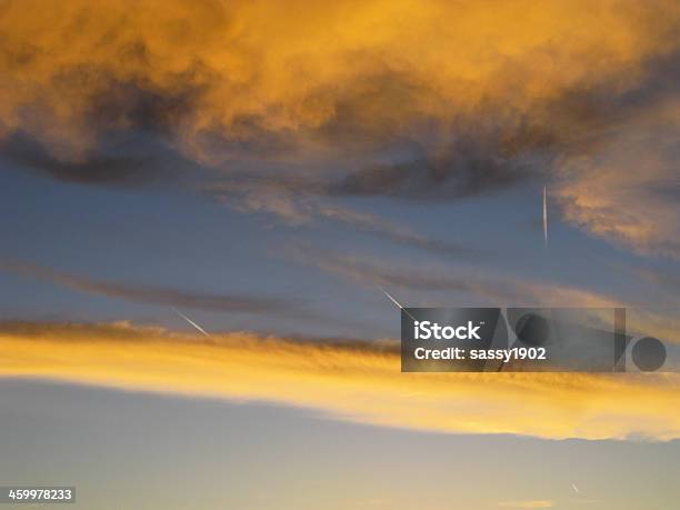 Sunset Clouds Jet Trails Stock Photo - Download Image Now - Cloud - Sky, Cloudscape, Color Image