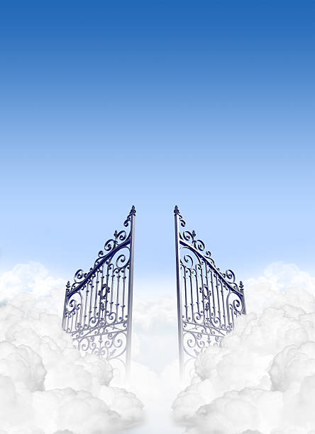 istock Two opening metal gates in the clouds 459979539
