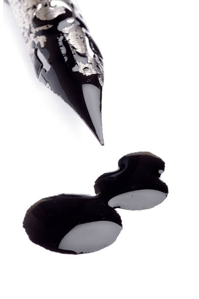 istock Ink pen and blot on the white background 459980025