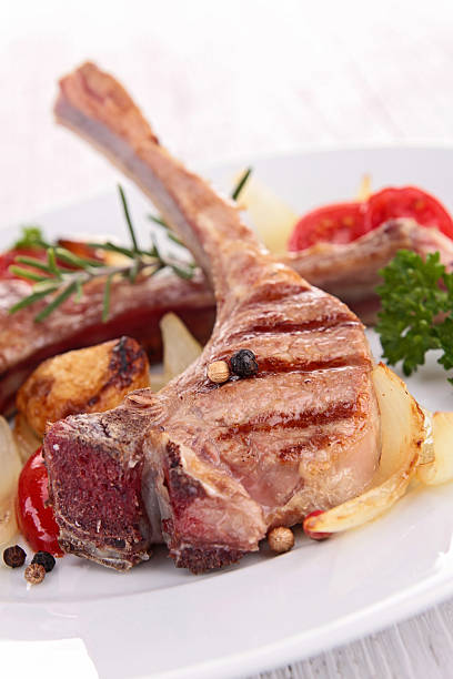 istock roasted lamb chop and vegetables 459981767