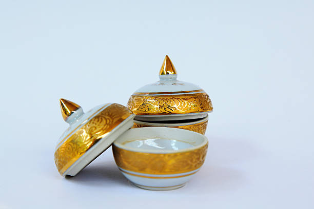 istock Thai vase gold on the white background 459983529