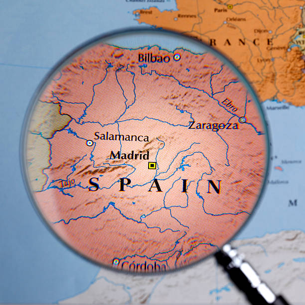 istock Magnifying glass over a map of SPAIN 459986421