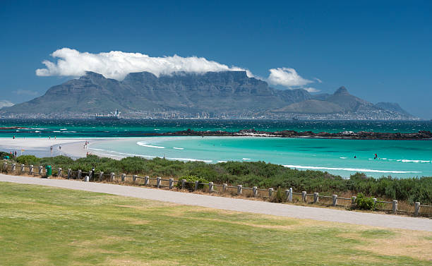 Table Mountain, Cape Town, South Africa Table Mountain, Cape Town, South Africa. You can see the famous "table cloth" clouds covering part of the peak. table mountain and the tablecloth stock pictures, royalty-free photos & images