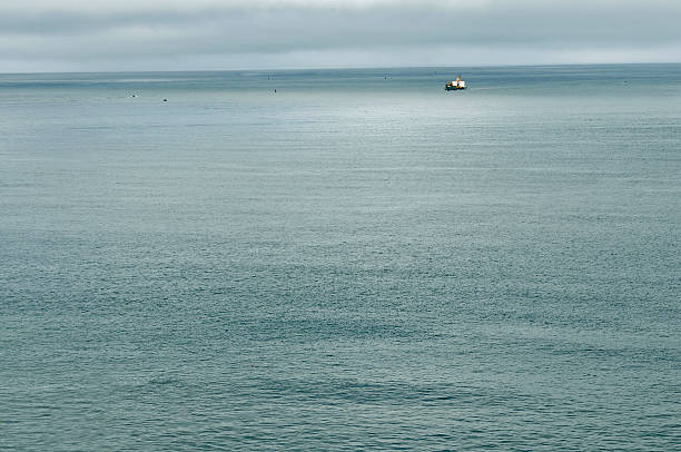 istock Freighter approaching river mouth from ocean off Washington coast 459986909