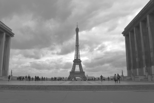 Paris, France - September 30, 2018: Viewing Eiffel tower with overcast sky in black and white.