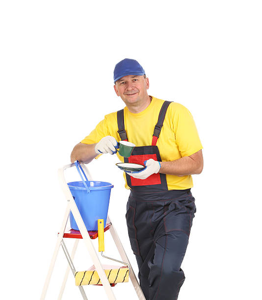 istock Worker on ladder with cup of tea. 459993763