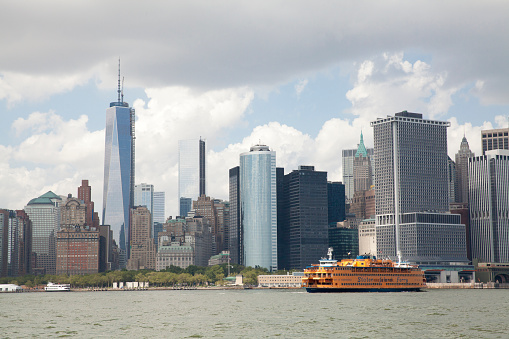New York City, USA - July 14, 2013: Staten Island Ferry between Manhattan and Governors Island in  New York City. Staten Island Ferry is a free rides that offers great views of the skyline, and also carries cars.