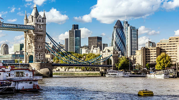 London skyline seen from the River Thames Financial District of London and the Tower Bridge tower 42 stock pictures, royalty-free photos & images