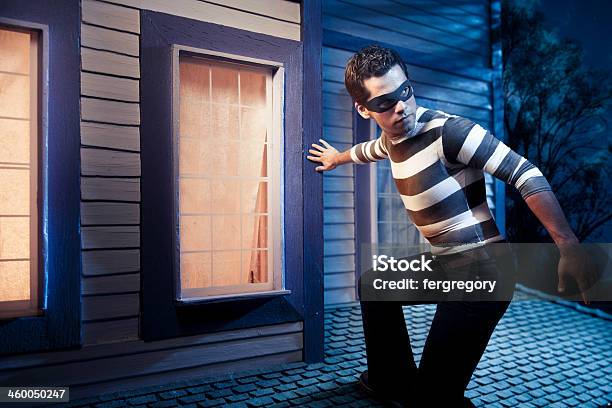 Burglar On The Roof Of A House Stock Photo - Download Image Now - Adult, Adults Only, Burglar