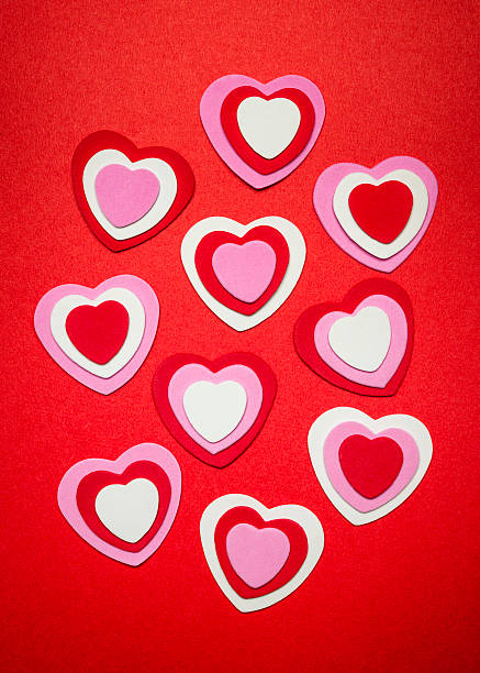 Red and pink Valentines day hearts Romantic red pink and white hearts for Valentines day felt heart shape small red stock pictures, royalty-free photos & images