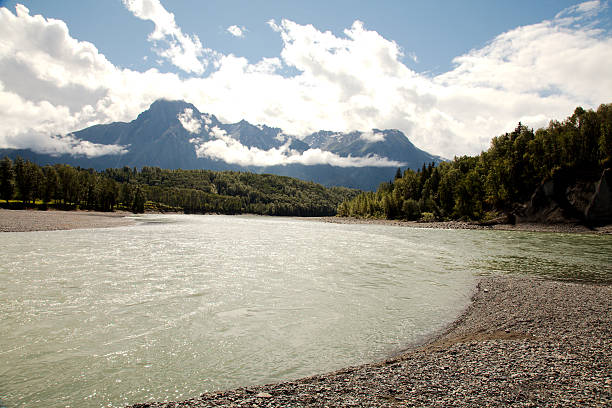 Skeena River at Hazelton with Rocher Deboule Range in background and Bulkley River on left.