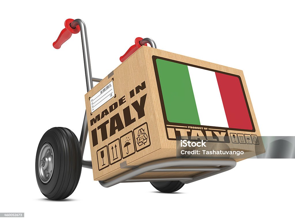 Made in Italy - Cardboard Box on Hand Truck. Cardboard Box with Flag of Italy and Made in Italy Slogan on Hand Truck White Background. Free Shipping Concept. Italy Stock Photo