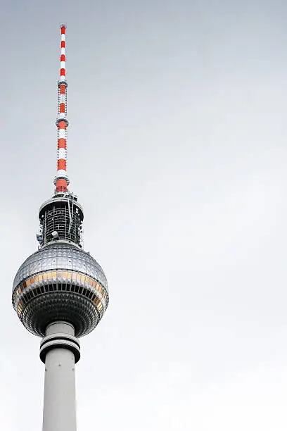 The famous Tv Tower of Berlin located at the "Alexanderplatz". The tower is 365 meters tall and one of the landmarks of the City.