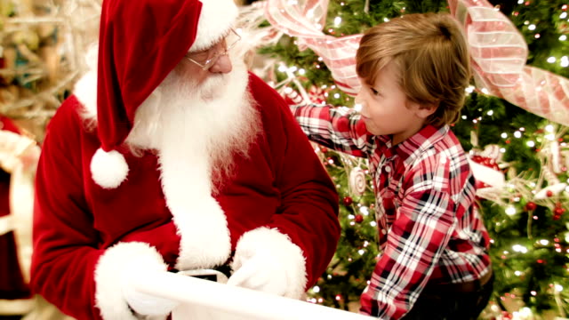 Boy talking to Santa