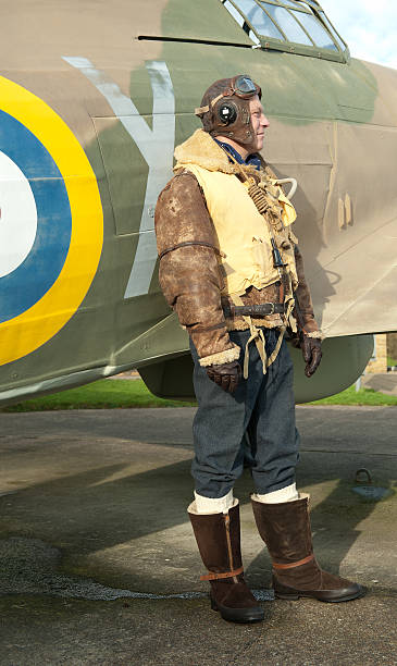 istock WW2 RAF Pilot With Hurricane Aircraft 460068823