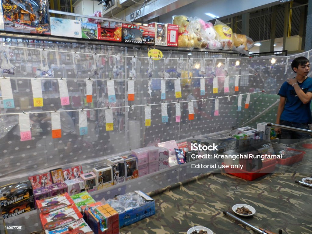 Gioco Sparando-negozio a Taiwan - Foto stock royalty-free di Adulazione