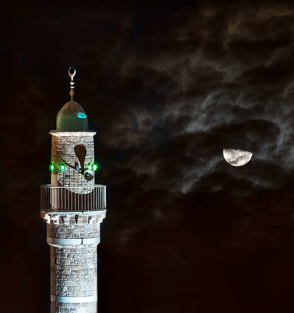 antiga mesquita minarete à noite em jaffa - shot tower - fotografias e filmes do acervo