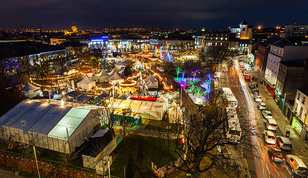 istock Christmas Market at night, panoramic view 460094193