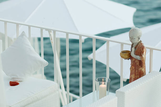 istock white cafe terrace by the sea 460094353