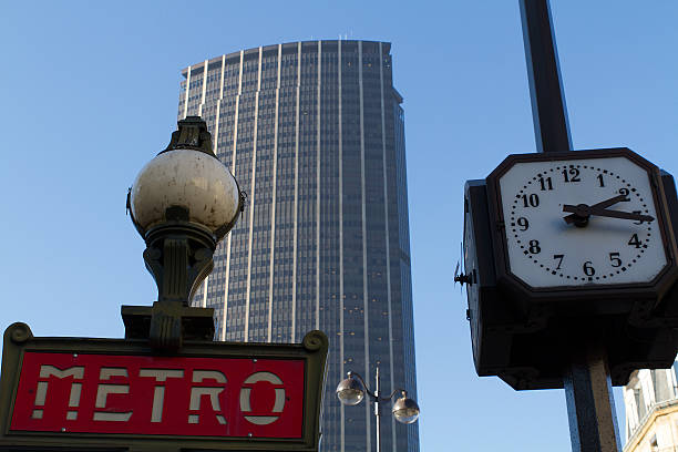 istock Metro sign, clock, floor lamp, Montparnasse tower 460126791
